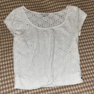 white cropped t-shirt with hole pattern